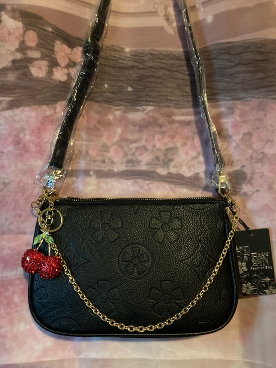 Source Unknown Handbags - Source Unknown Black Floral-Embossed Crossbody Bag with Red Pom Charm